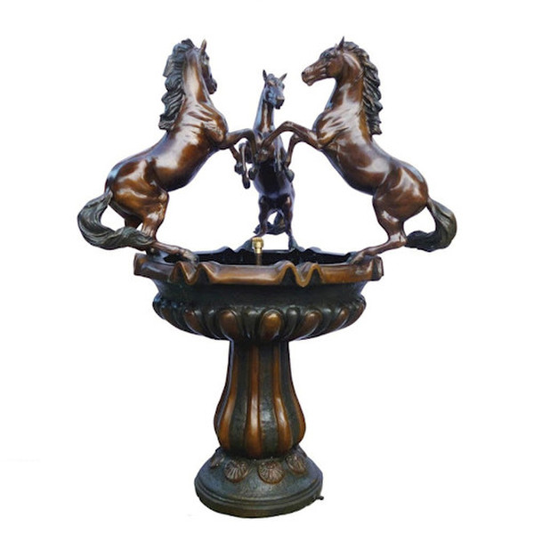 Fountain bronze horses are adorned in a luxurious brown patina